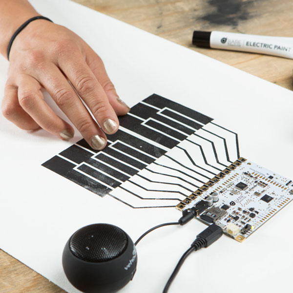 Electric paint keyboard connected to a touch board